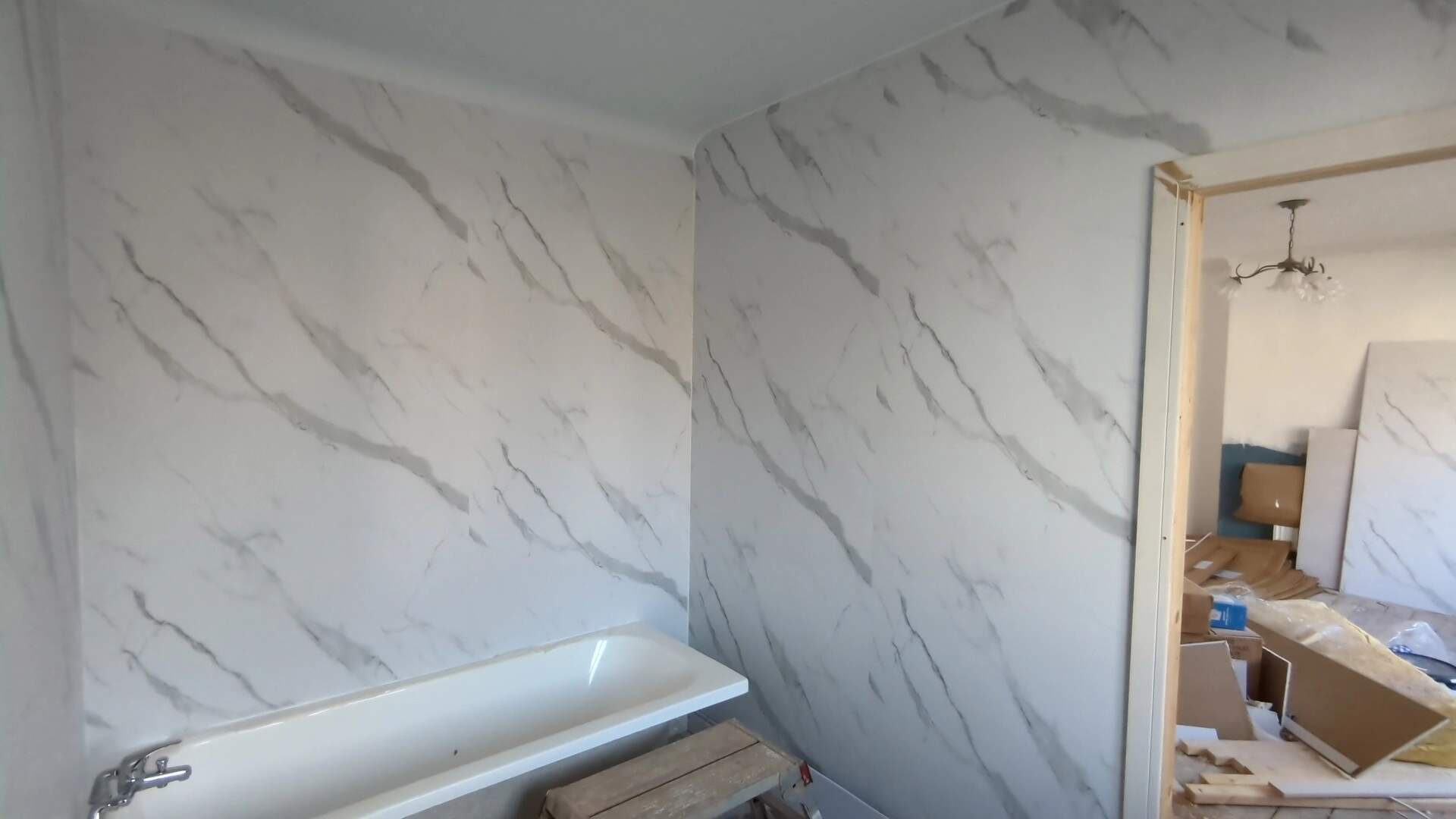 Wet wall panels fitted above the bath in a Doncaster ensuite, joined into the corner