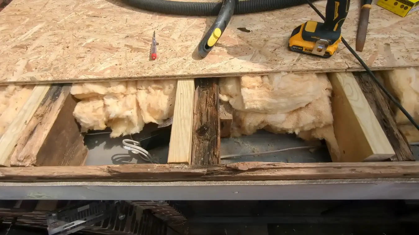 Detail of new roof joists, replacement firrings and insulation