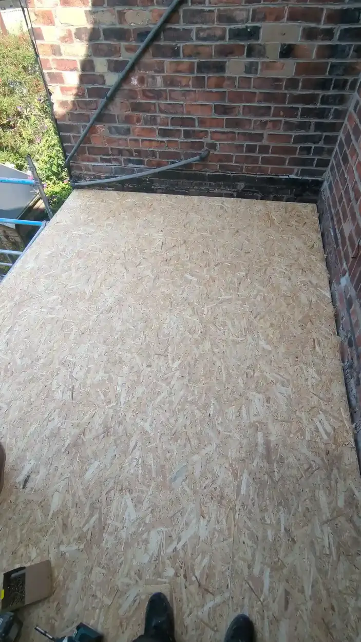 Flat roof fully boarded with new OSB decking, neat and complete