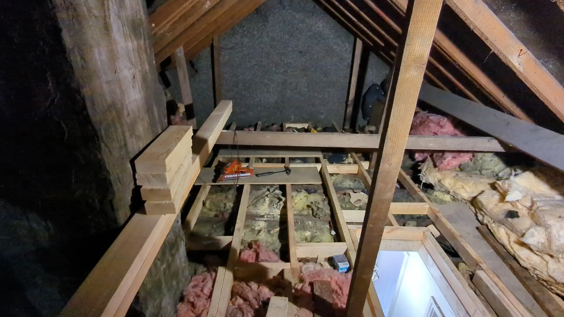 New loft floor joists installed across a South Kirkby loft ready for boarding
