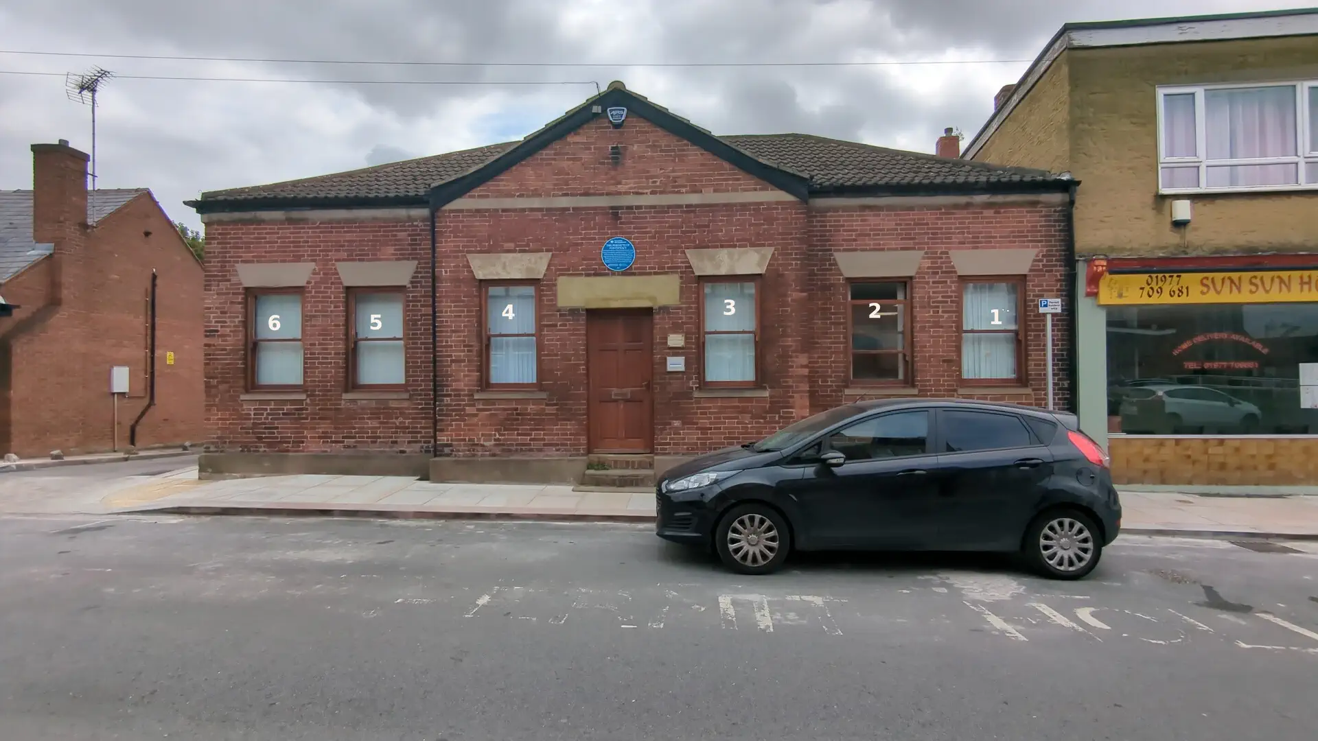 Front elevation of the former Perfect’s Hospital on Micklegate, Pontefract, with the six front timber windows numbered for the repair schedule