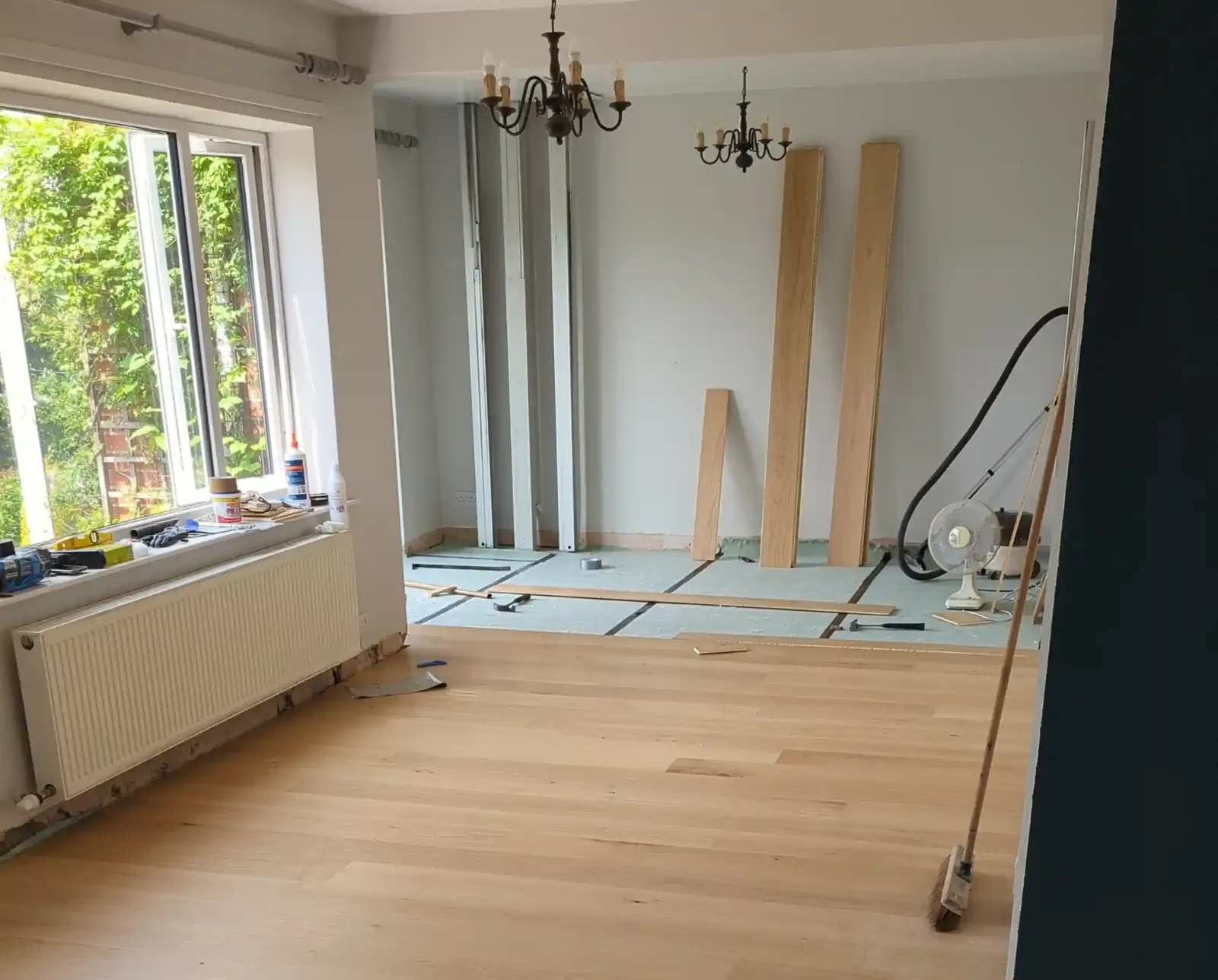 Engineered oak wood flooring laid across a room