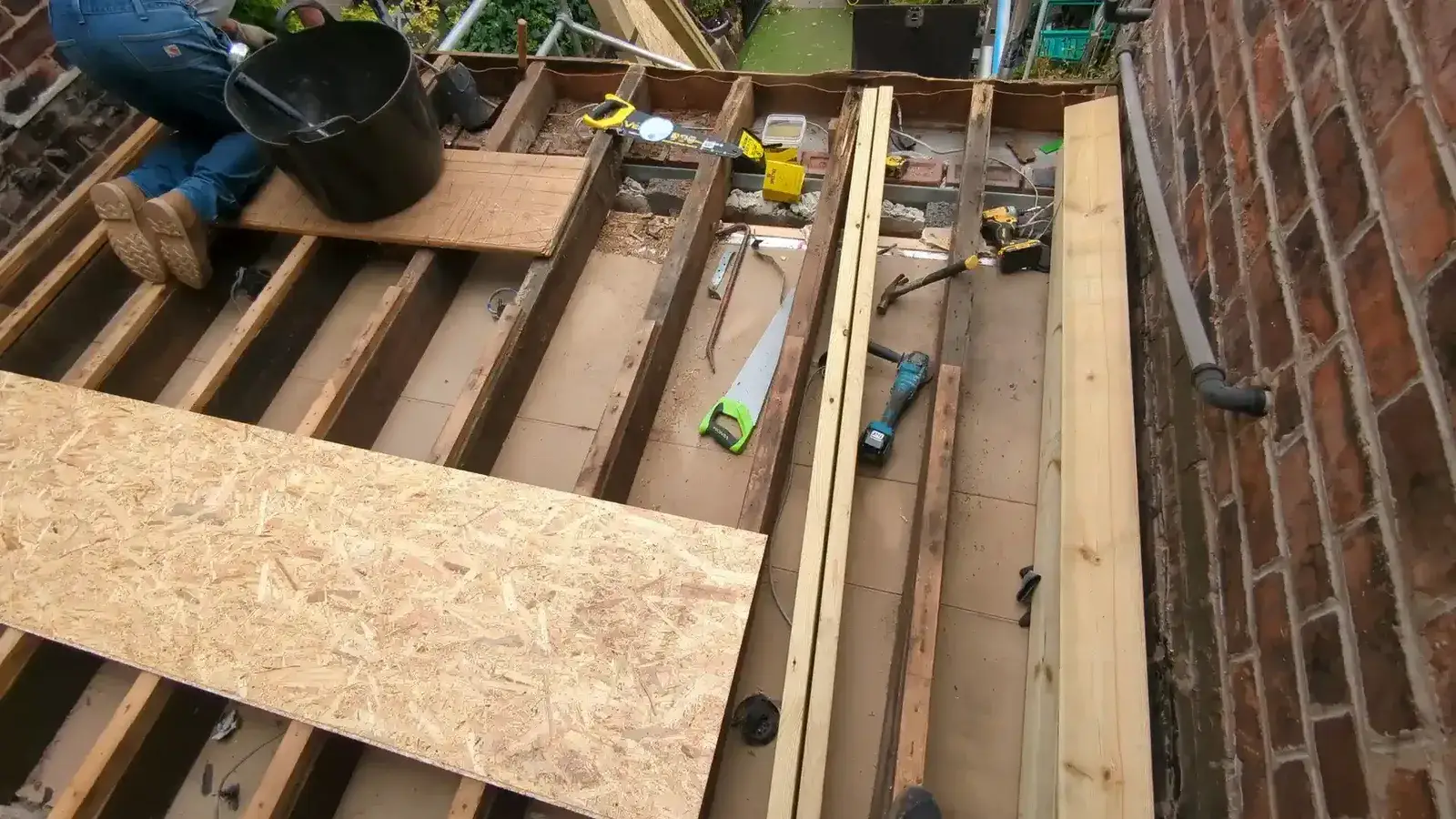 New 6x2 timber roof joists installed during a flat roof rebuild in Wakefield